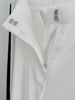 Detail view of Kasha Marlene trousers with hidden zip, discreet hook fastening, lined interior and premium flowing fabric