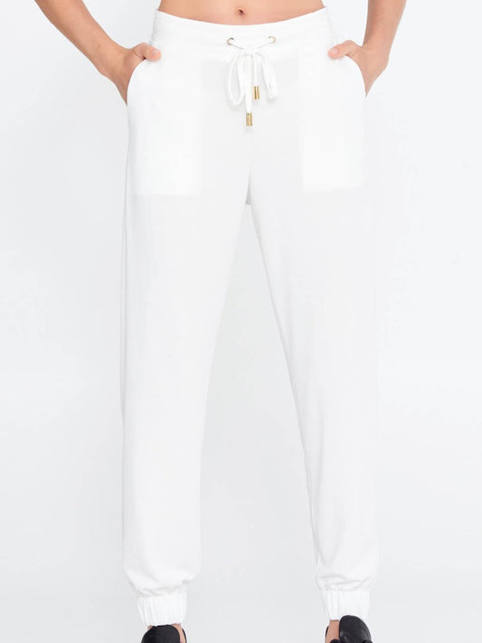Kasha white summer jogger pants for women with gold drawstring ends, soft breathable modal polyester blend and elegant normal fit