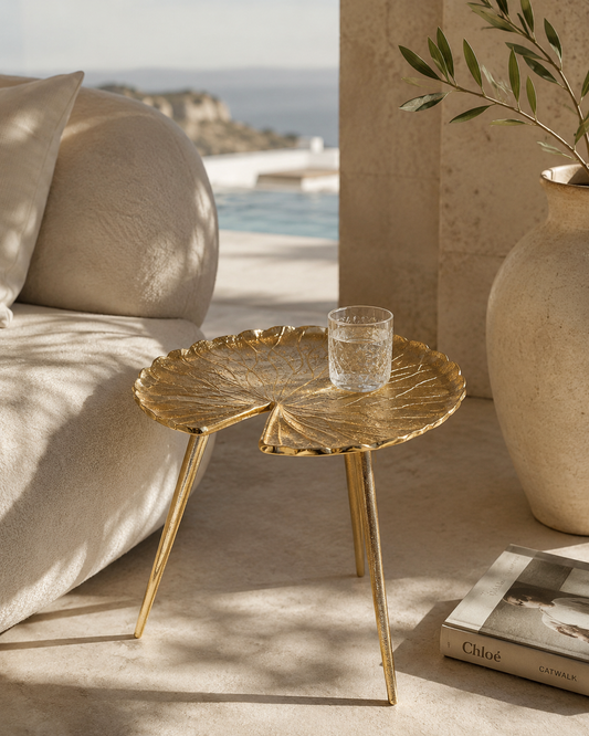 Luxury gold leaf side table in a Mediterranean interior for the Home & Lifestyle collection at VVC SHOP Sitia, Crete