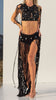 Front view of macramé River halter top black with fringes, shells, and sequins, handmade by ZOE, exclusive at VVC Sitia.