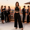 Melody black-gold macramé top side profile, versatile wedding guest or baptism outfit from Sitia clothing store