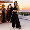 Black-gold macramé crop top with premium cotton and metal accents, festival fashion exclusive in Sitia