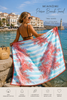 MiandMi beach pareo towel showing highly absorbent blue terry cloth reverse side in Crete