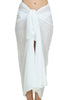 MiandMI white cotton pareo shown in a front-tied studio view, 100 × 180 cm lightweight beach sarong made in Greece, available at VVC SHOP Sitia, Crete.