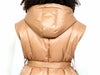 Close-up back view of the Michaela MII camel-brown hooded Daunt vest showing the hood and horizontal quilted finish, made in Italy.