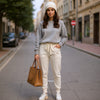 Front view of slim fit off-white fine-knit wool jogger trousers with elastic drawstring waistband