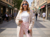 Slim fit wool trousers in soft pink with wide elastic waist and front pockets, front view