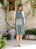 Front view of sporty hooded midi dress in mint petrol and ecru with large pocket by Polin, made in Turkey.