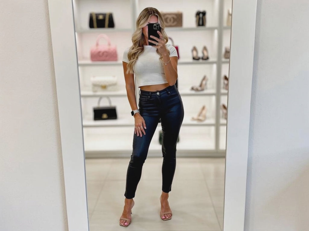 Dark blue skinny-fit trouser — front view, 5 pockets, mid-waist, laminated leather-look finish, easy-wash viscose-spandex-polyester