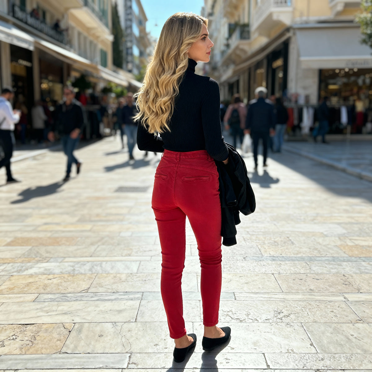 Full-length side and back profile showing red skinny jeans silhouette