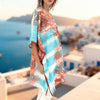 Woman wearing a colorful kimono-style top for plus size 
