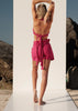 Pink halter top back view with extra long braided straps and matching boho shorts