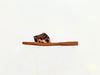 Bestseller brown leopard sandals styled as resort and beach outfit at VVC clothing store
