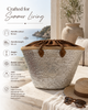 VVC handmade palm leaf beach basket featuring silver sequins, neon pink heart embroidery, leather handles and drawstring textile lining. Artisan-crafted luxury tote bag made in limited quantities for summer travel and beach lifestyle.