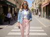 Soft pink slim fit wool trousers with wide elastic waistband and drawstring, front view