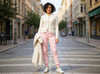 Front view of the Sunny off-white textured button-up knit cardigan with two pockets at VVC Shop Sitia.