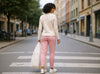 Back view of the Sunny off-white textured slim-fit knit cardigan with ribbed hem, made in Italy and available at VVC Shop Sitia.