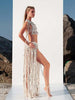 Side profile of the Tulum shell fringe wrap skirt with adjustable tie closure, available from VVC Shop Sitia Crete.