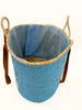 Interior view of the handmade VVC™ anchor basket showing spacious storage capacity, woven palm leaf construction and practical design for beach, shopping and travel use.
