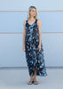 Full-length front view of the VVC blue-and-black floral sequin mullet evening dress with a flowing A-line silhouette.