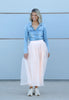 Blue shirt styled with VVC soft peach tulle skirt, elegant wedding guest look and special event outfit in Crete