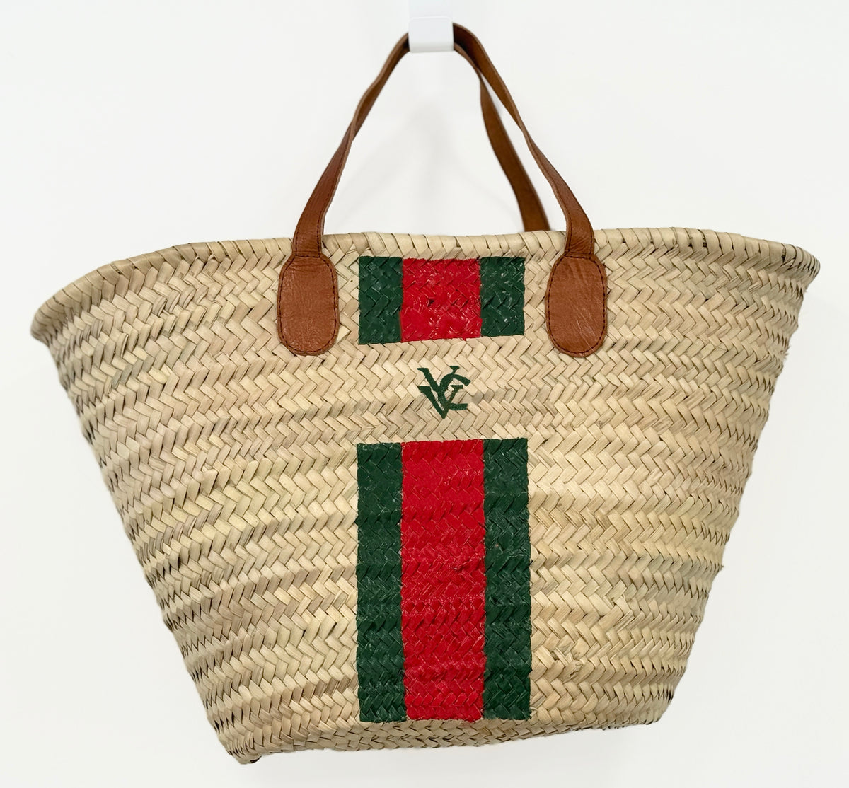 VVC handmade palm leaf basket with green and red stripe design and leather handles for beach, market and shopping use.