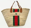 VVC handmade palm leaf basket with green and red stripe design and leather handles for beach, market and shopping use.