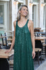 Full front image of vibrant green sequin maxi dress featuring mullet hem and elegant summer design.
