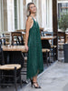 Side view of loose-fit green maxi dress with mullet cut and black sequin pattern, made in Greece by VVC™.