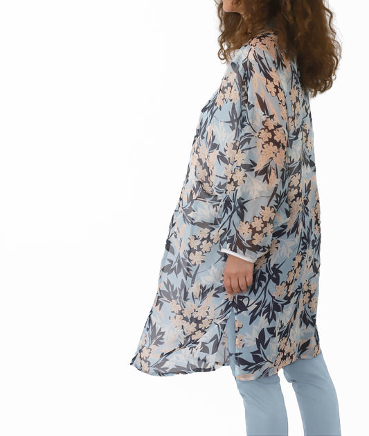 Side view of VVC Italian silk kimono with blue floral print on white background, one size handmade silk layer made in Sitia, Crete
