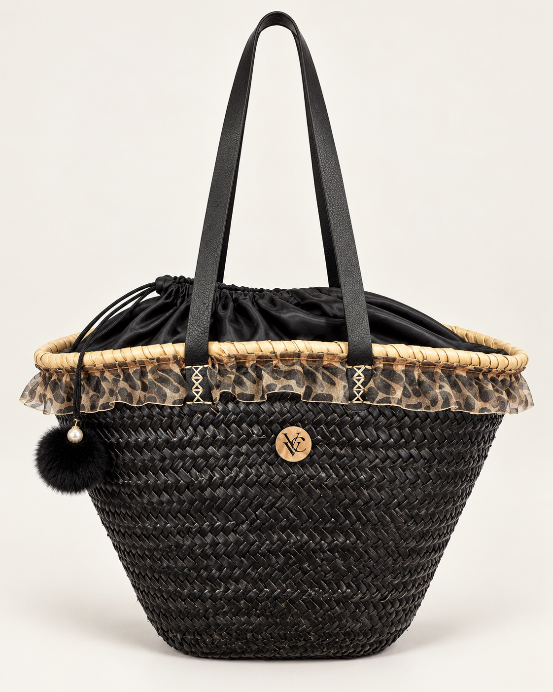 VVC™ large black raffia basket bag with leopard-print drawstring lining and black leather handles, front view