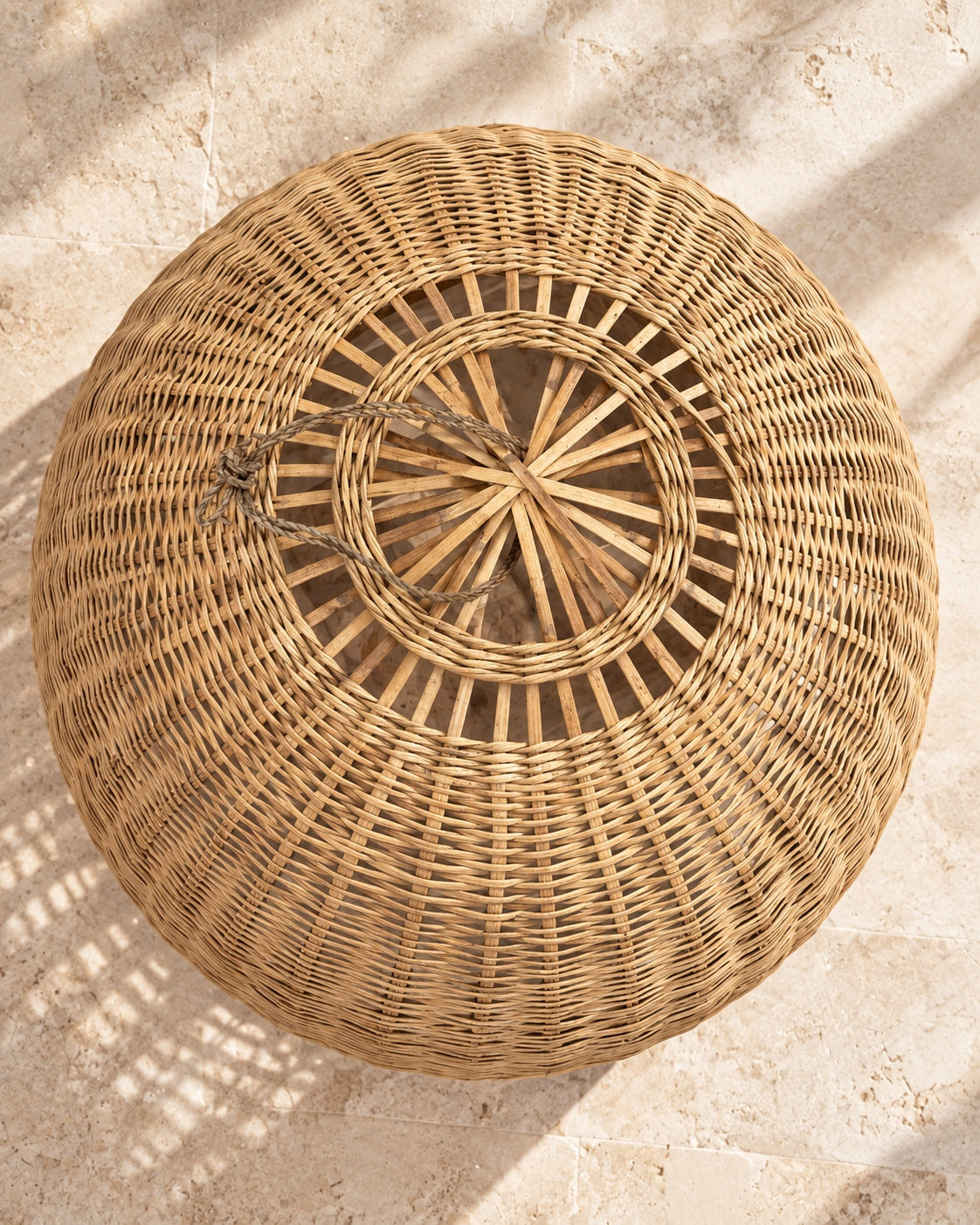 Top view of VVC monumental raffia lampshade showing the handwoven structure and hanging loop