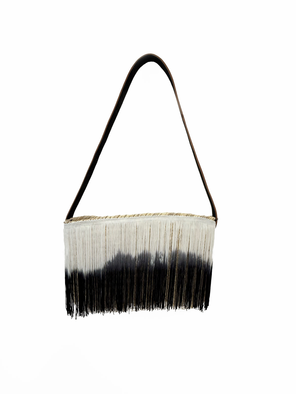 Handmade raffia shoulder bag by VVC with black and white fringes, leather shoulder strap and compact summer design