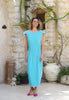 Front view of turquoise and neon pink maxi dress for curvy women with waist-slimming design and strong shoulders by VVC™ Greece