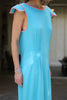 Side view close up of turquoise and pink structured maxi dress highlighting slimming waist and shoulder pad design, made in Greece by VVC™.”