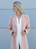 Close up front view of collar of powder pink long coat handmade in Greece by VVC.