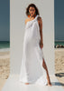 Front view of the VVC white one-shoulder maxi dress with handcrafted macramé shoulder