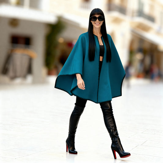Michaela MII petrol poncho featuring wool-touch black embroidery, soft, elegant, and practical polyester alternative to wool, made in Italy