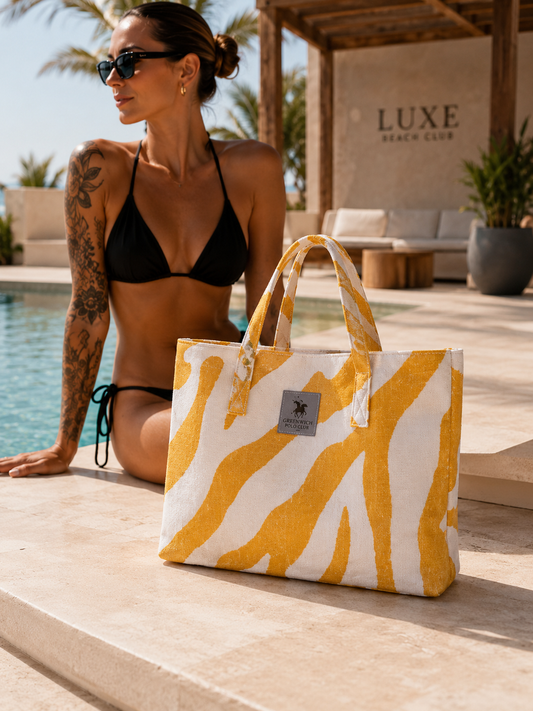 Luxury Greenwich Polo Club zebra beach bag 3741 showcased at exclusive Mediterranean beach club with VVC black bikini styling, available online and at VVC Shop Sitia Crete for premium summer shopping and luxury beach lifestyle lovers