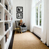 Cowhide zebra accent chair positioned next to coffee table and floor lamp in contemporary home setting
Lifestyle Image 3