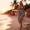 Front angle showing zebra beach cover-up with open sides and maxi length, stylish beach club look by Zoe