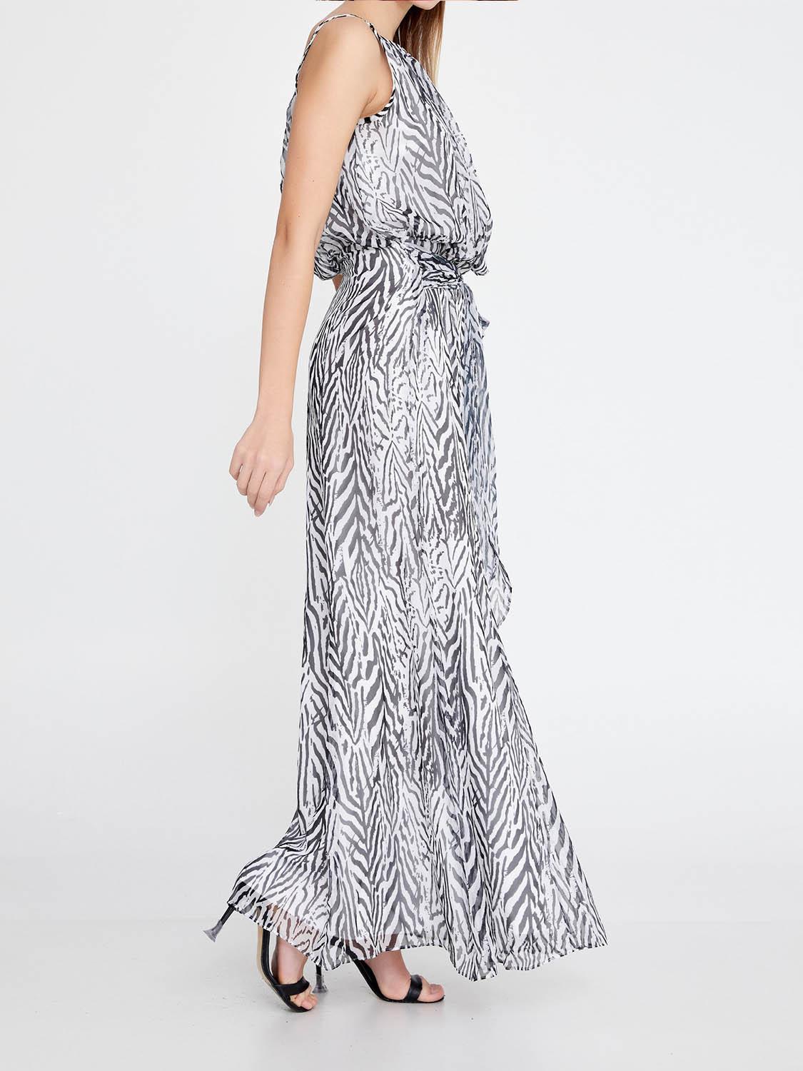 Side view of extra long grey and white zebra maxi dress with waist belt, designed as a comfortable event dress for weddings, baptisms and receptions in Crete