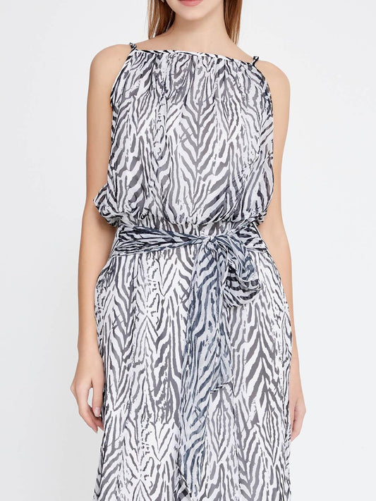 Front view of grey and white zebra maxi dress with spaghetti straps, waist belt and double lining for elegant events, weddings and baptisms in Sitia, Crete