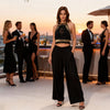 Zoe the Label black gold macramé top styled for a luxury event look, festival outfit and exclusive summer party fashion outfit from Sitia clothing store